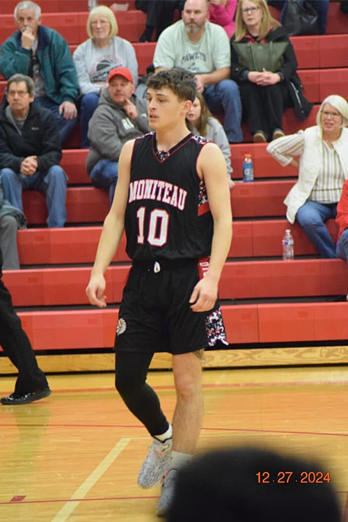 male basketball player walking