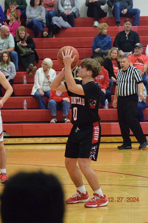 male basketball player shooting