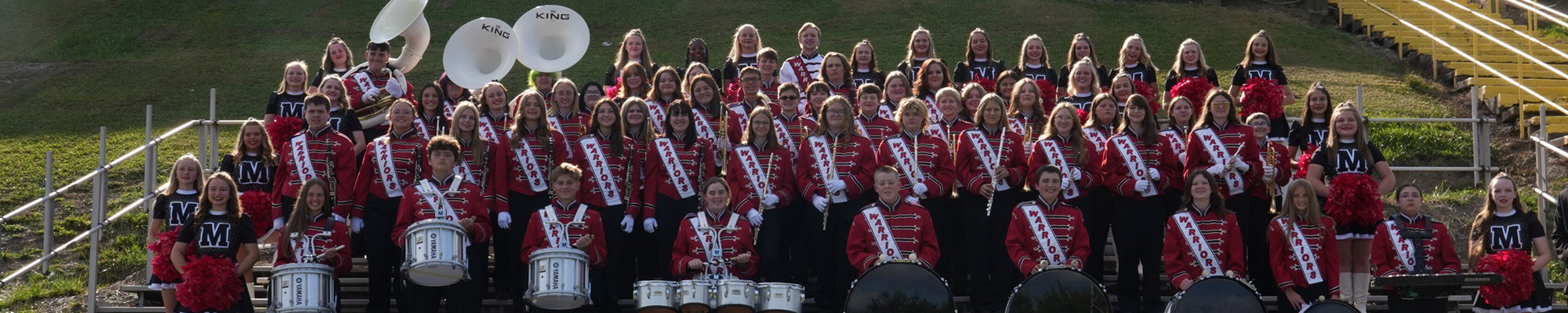 Band team photo outside 