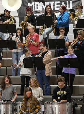 Pep band playing in the bleachers